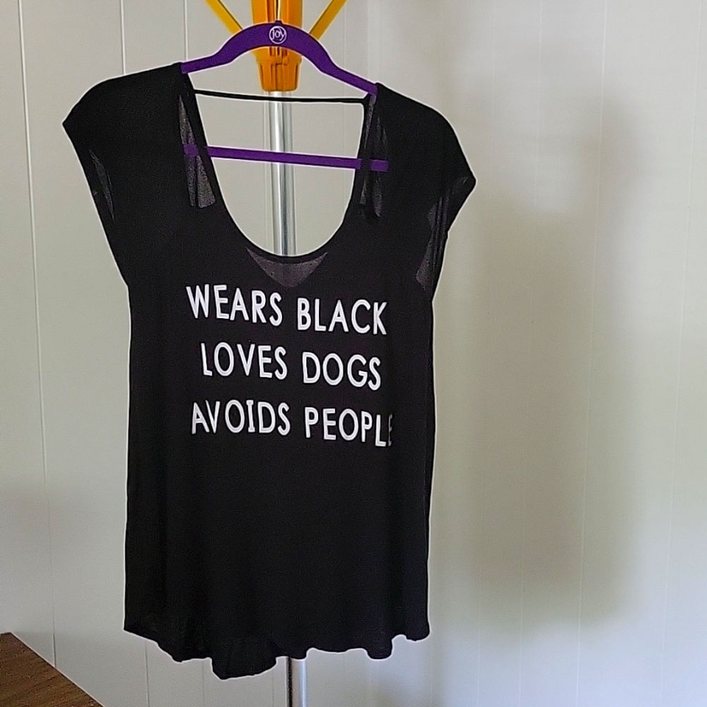 Flowy, oversized black top. Says "Wears black, Loves Dogs, Avoids People." XS